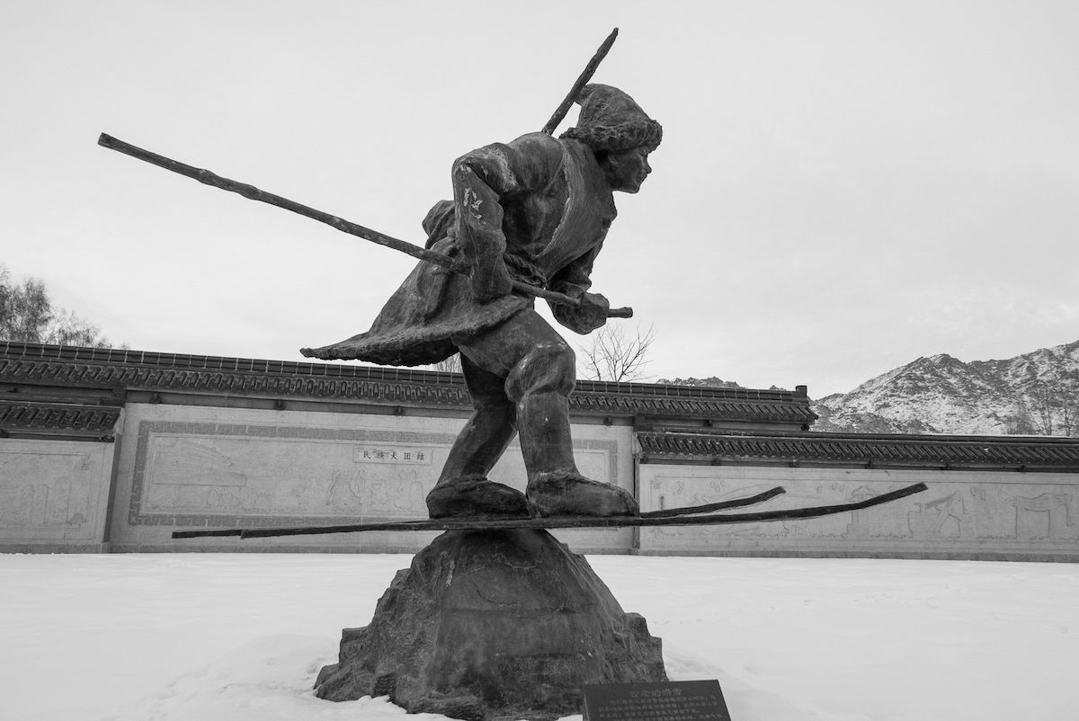 Traditional skier statue in Khanderghatu village - Chinese Altai
